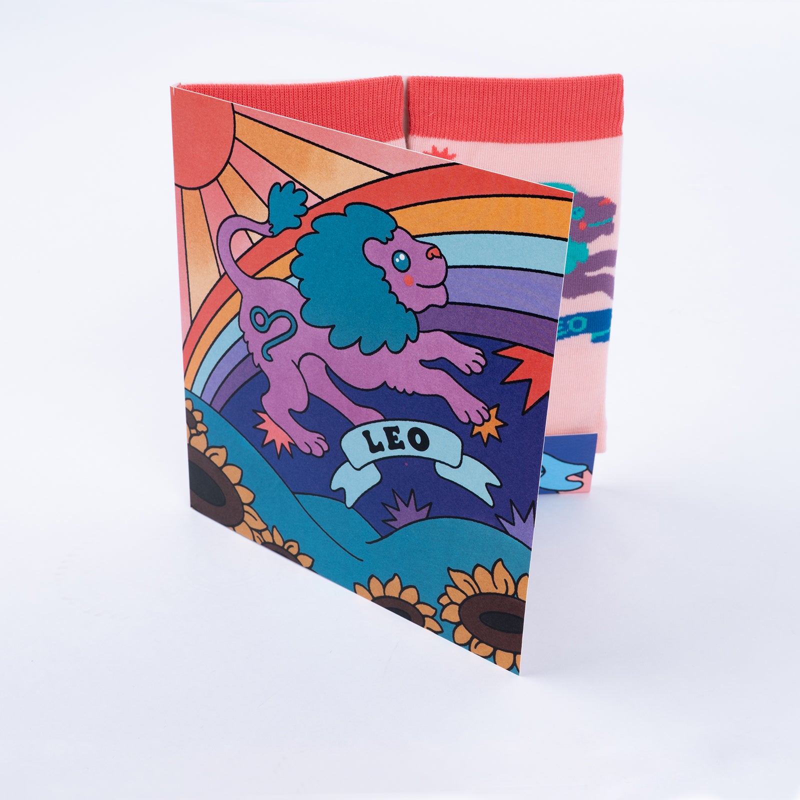 Leo greeting card open showing socks inside