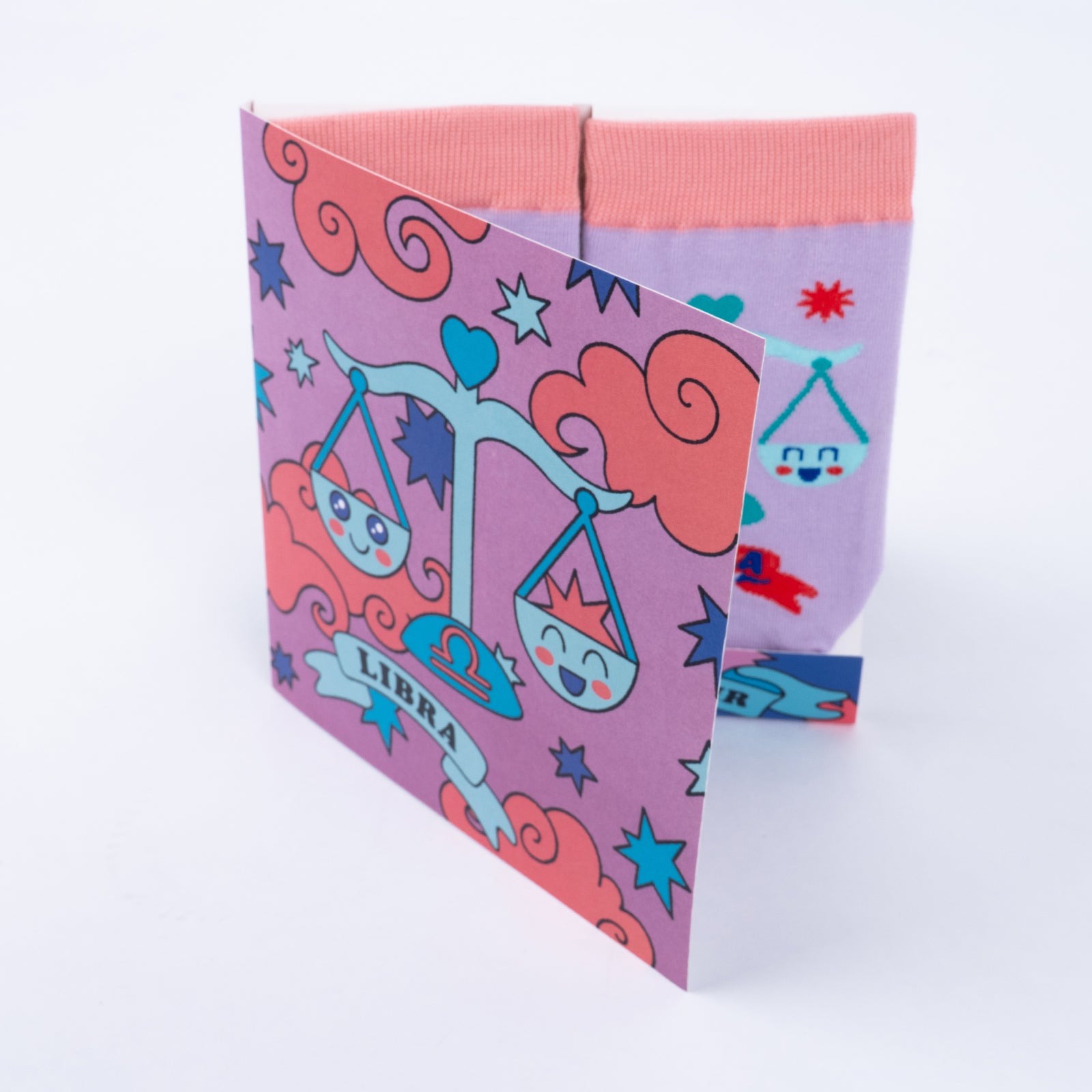 Libra greeting card open showing socks inside