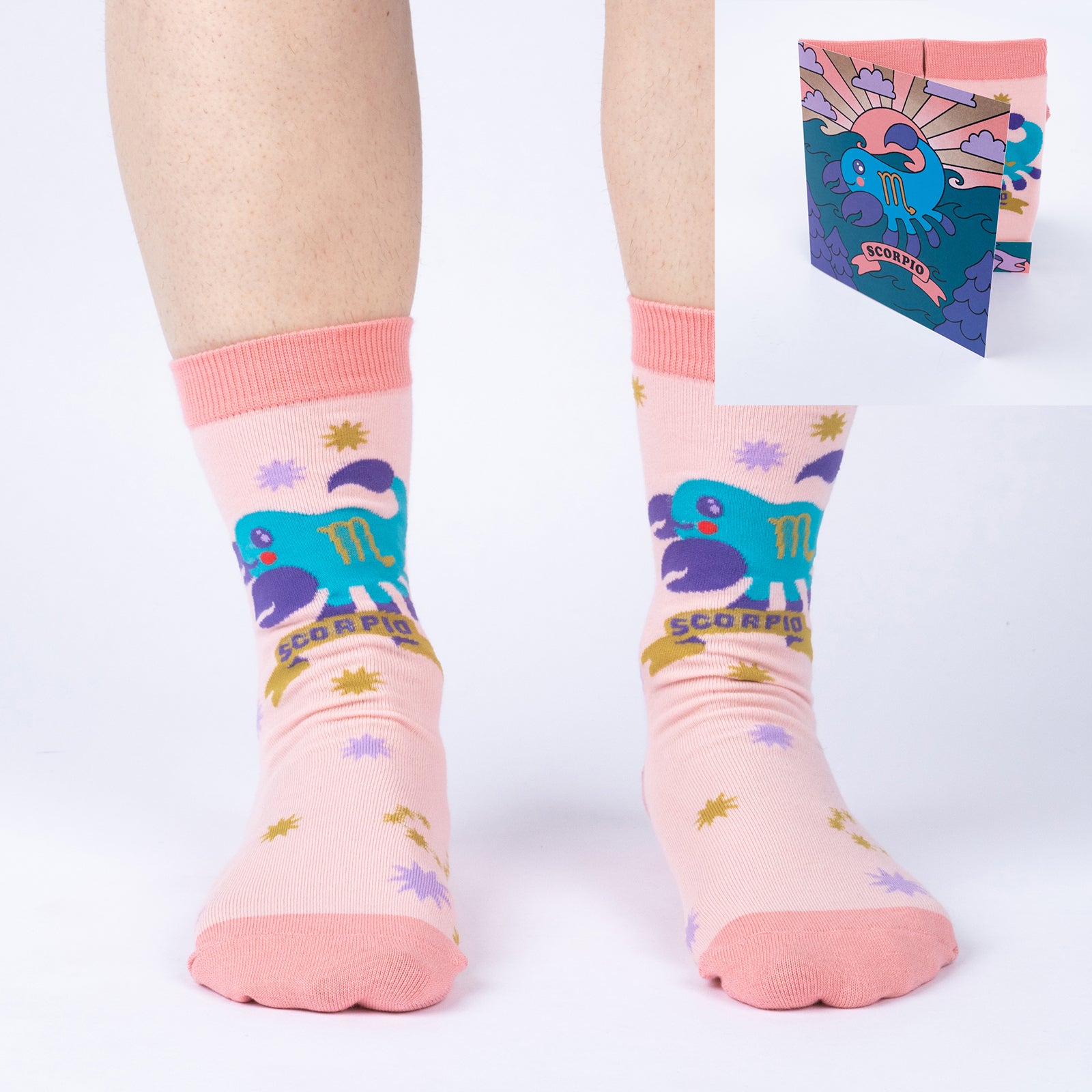 model wearing Scorpio crew socks with inset image of Scorpio greeting card in corner