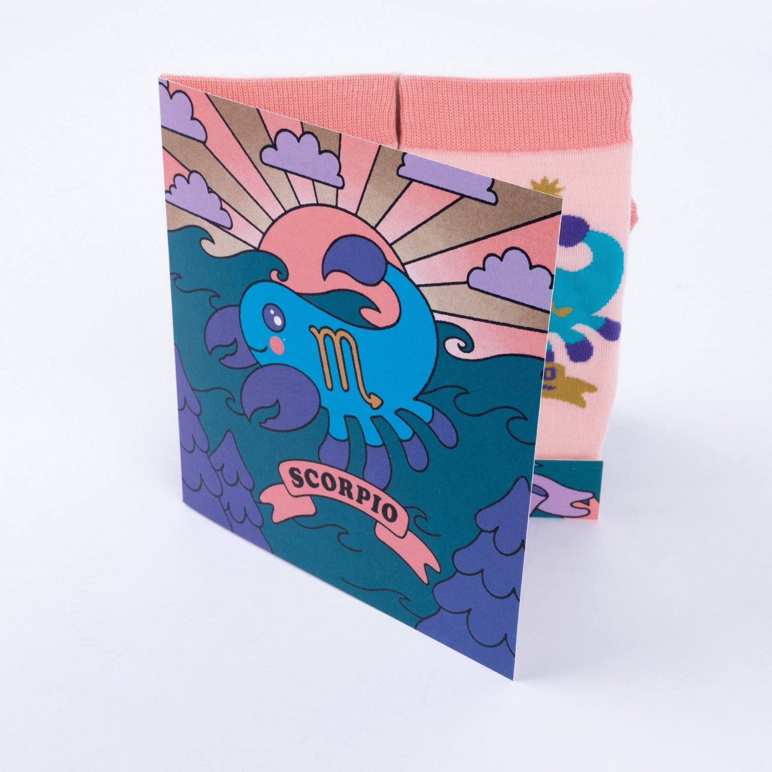 Scorpio greeting card open showing socks inside
