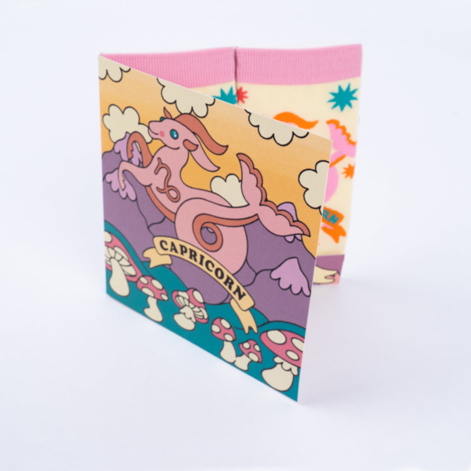 Capricorn greeting card open showing socks inside
